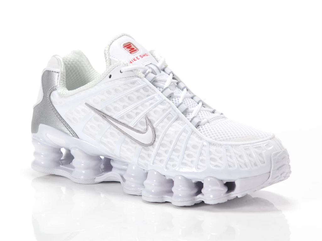  Shox TL - Sneakers uomo Nike. Disponibile in diverse taglie: 41, 42, 43, 44, 45 e colori argento, bianco. YOUSPORTY.