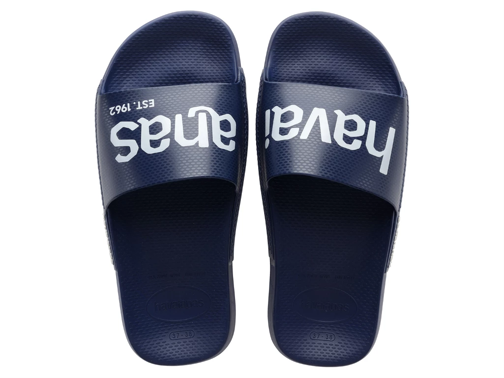  HAV. SLIDE CL.LOGOMANIA - Infradito uomo Havaianas. Disponibile in diverse taglie: 43, 44 e colori blu scuro. YOUSPORTY.