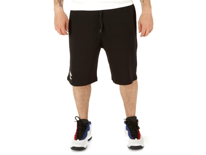  Bermuda in felpa - Pantaloncini uomo Umbro. Disponibile in diverse taglie: s e colori bianco, nero. YOUSPORTY.