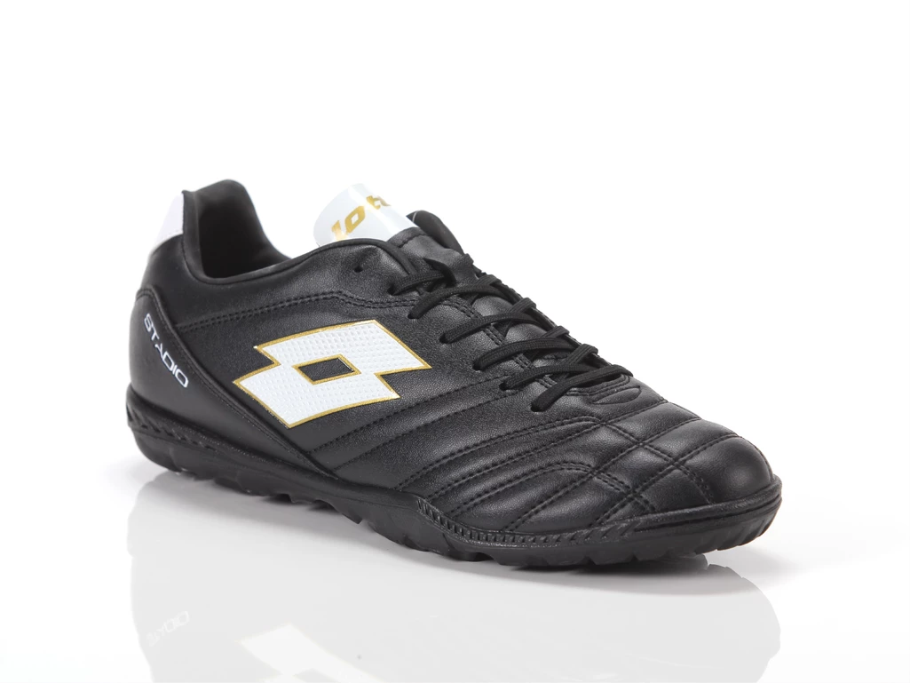  Stadio 705 TF - Calcio uomo Lotto. Disponibile in diverse taglie: 42, 43, 45 e colori bianco, nero. YOUSPORTY.